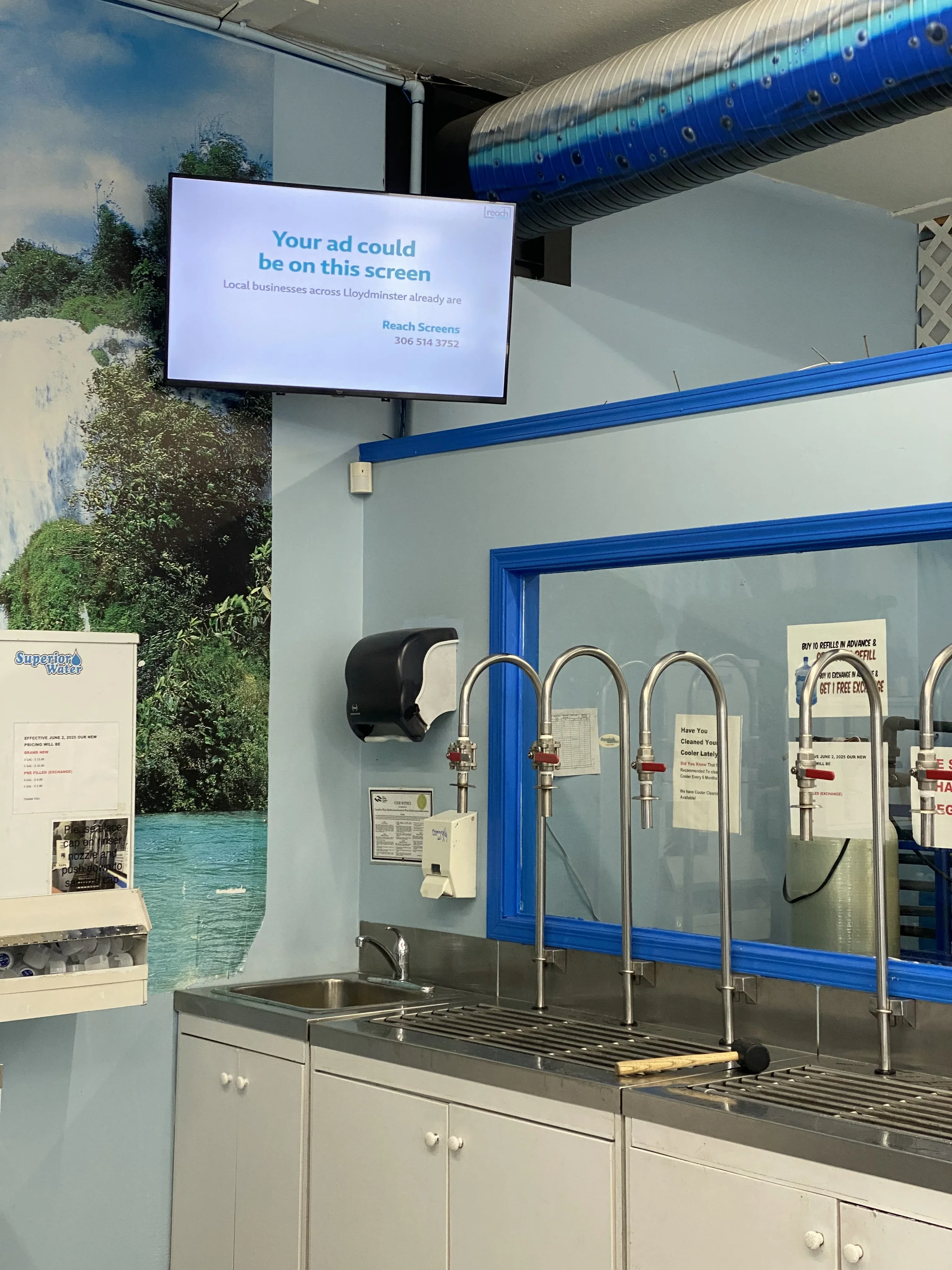 Water refill station with display screen